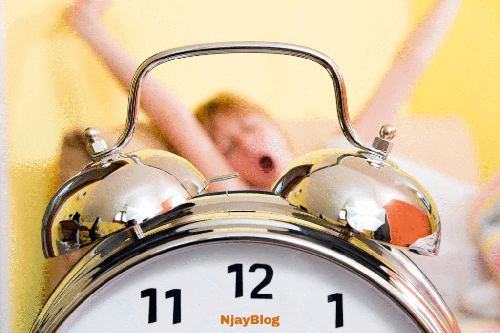 Blog graphic of a clock and someone waking up