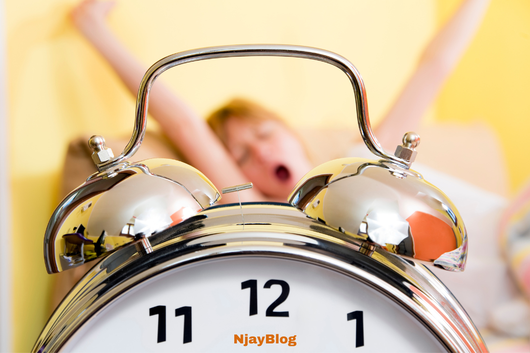 Blog graphic of a clock and someone waking up